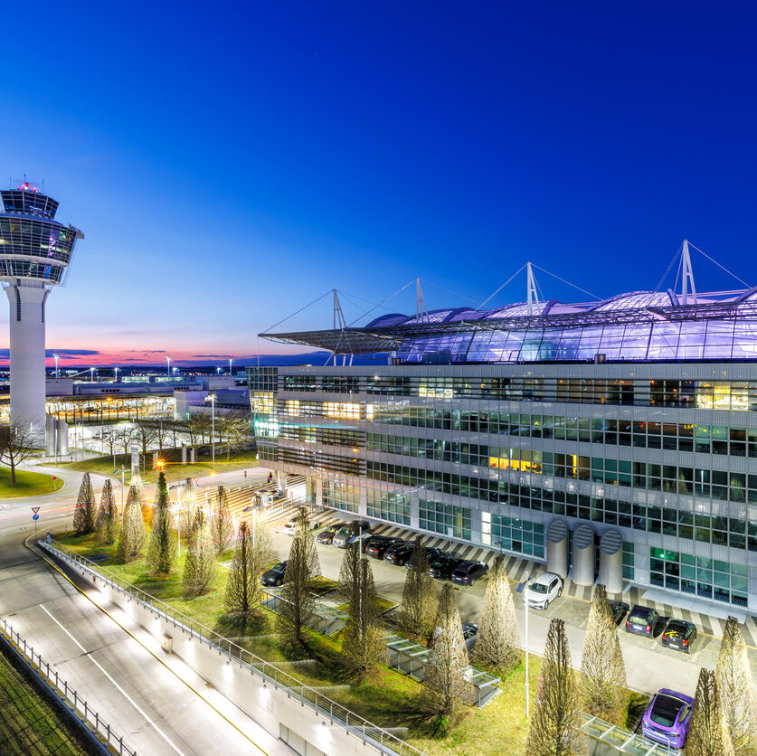 Munich, Germany - February 6, 2024: Tower and MAC Munich Airport Center at Munich Airport (MUC) in Germany.